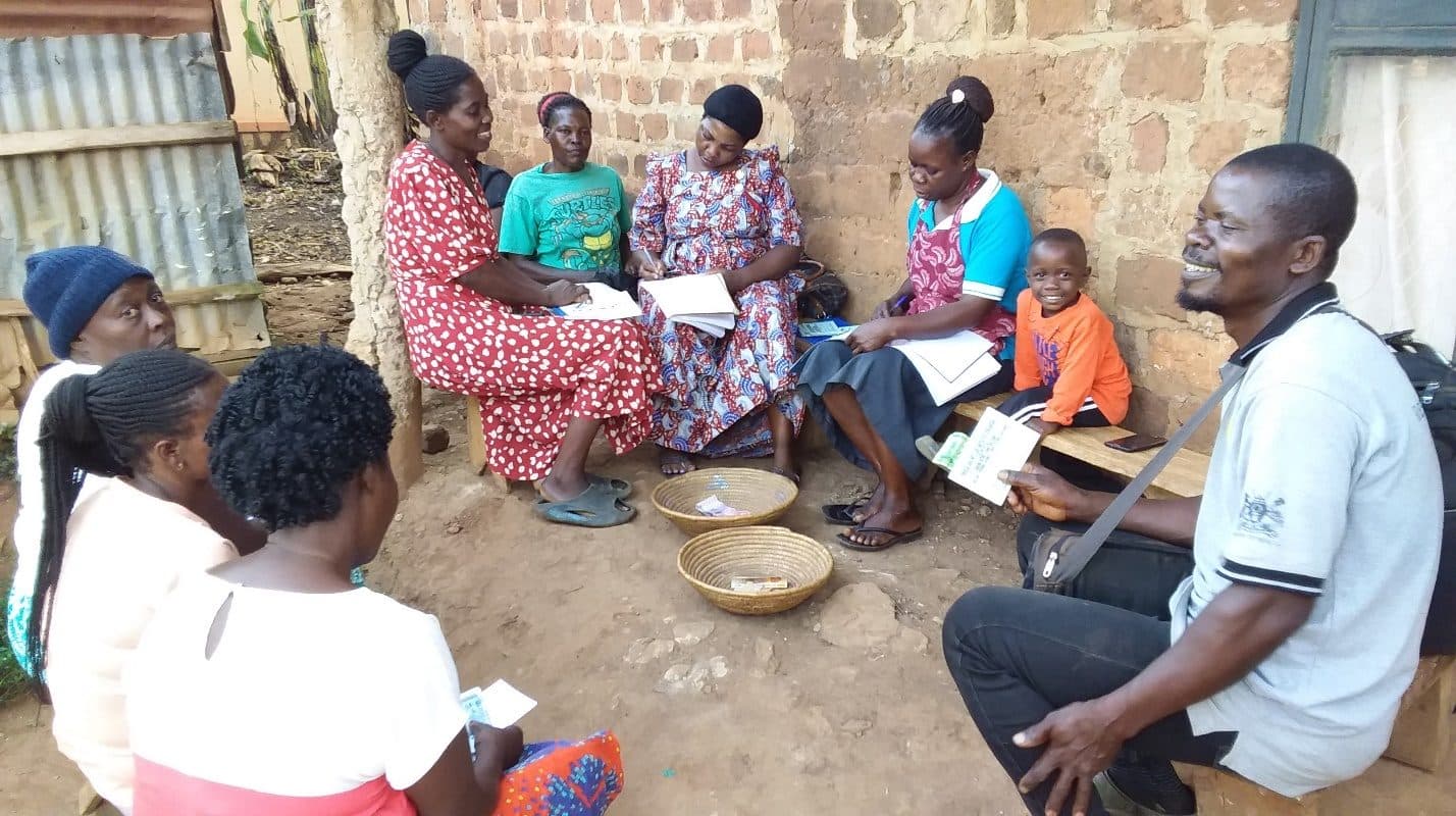 Members of Kwagalana Welfare Initiative Kirangira at their weekly savings meeting