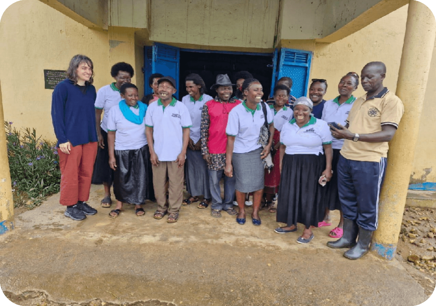 A German researcher with Namulugwe community members during feedback data collection